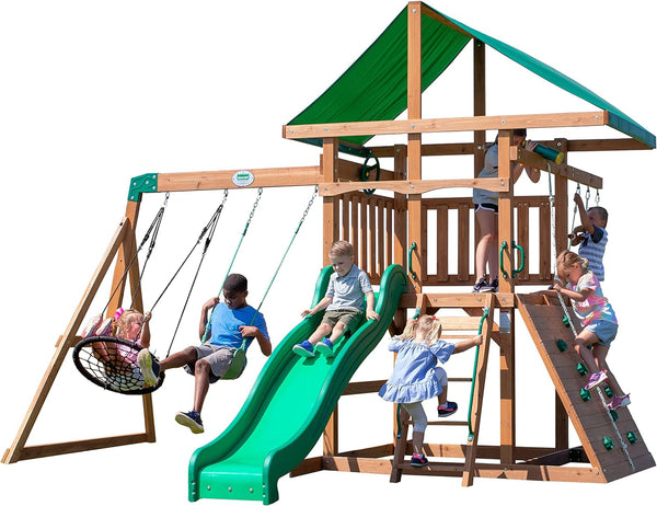 A complete set of wooden mountain-style swings, equipped with a colorful canvas sunshade, a wave slide, a rope swing, a net swing, and a rock wall with climbing ropes and ladders. X4829